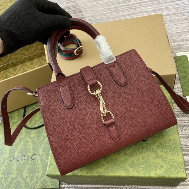 G*u*i top handle bags